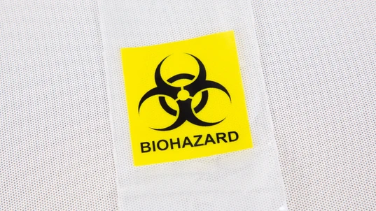 Plastic biohazard bag with logo brand and text sign