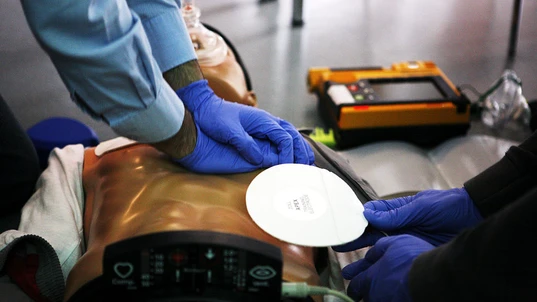 CPR with AED pad