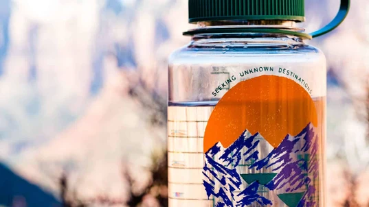 Hiker's water bottle printed with the words Seeking Unknown Destinations