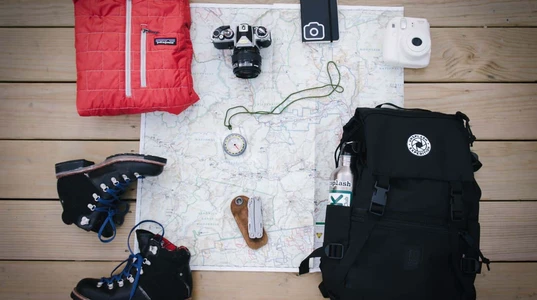 Hiking essentials laid out before taking to the trail