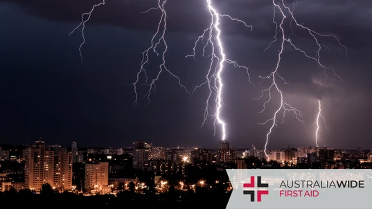 Lightning strikes over a city 