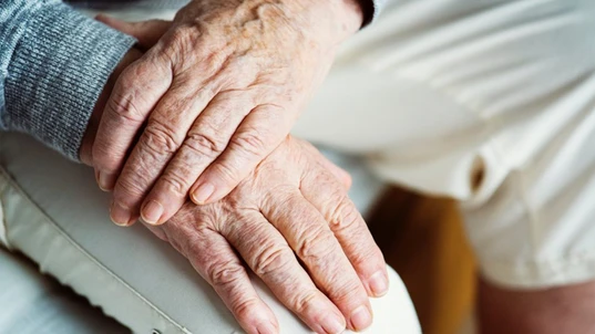 The hands of an elderly person